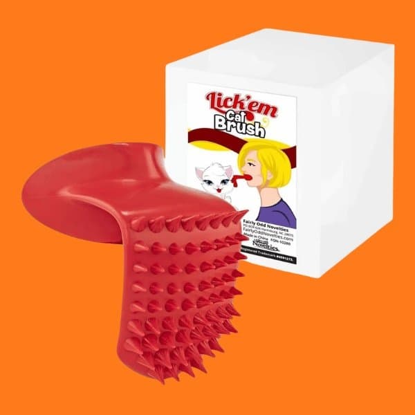 The Cat Brush You Hold in Your Mouth Because Apparently That's Where We Are Now
